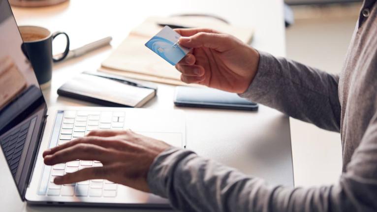 Making an online payment with a credit card.