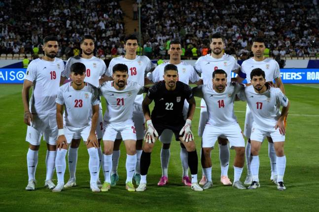 Iran’s players pose for a team photo before an Asian group A qualifying football match against North Korea for the 2026 World Cup on June 10, 2025, at Azadi Stadium in Tehran, Iran. 