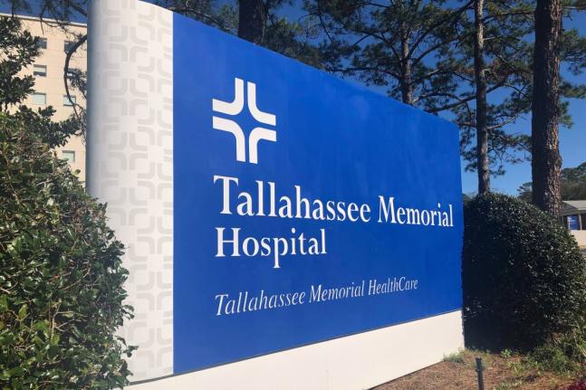 A sign is seen outside Tallahassee Memorial Hospital on February 3, 2023, in Tallahassee, Fla. (AP Photo/Anthony Izaguirre, File)