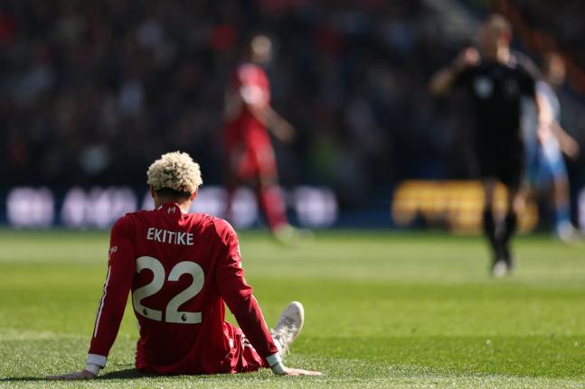 AP 
Liverpool’s Hugo Ekitike sits injured during the English Premier League football match against Brighton in Brighton yesterday.