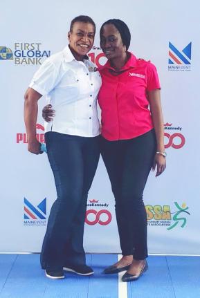 Colleen Montaque (left), Inter-Secondary Schools Sports Association executive, with Kimberly Smalling, account executive and Main Event Entertainment Group’s project manager for the ISSA/GraceKennedy Boys and Girls’ Athletics Championships.