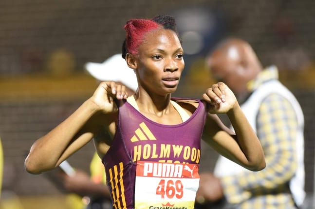 Jovi Rose of Holmwood Technical celebrates after winning the Class One girls 1500mat Champs 2026.