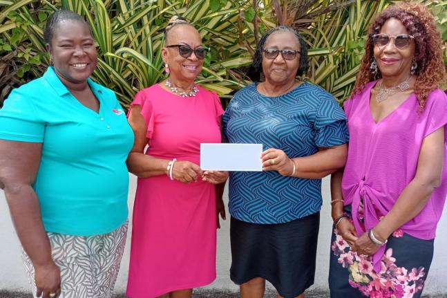 Vana Taylor (second left), chairman of the Jamaica Hotel and Tourist Association Ocho Rios Runaway Bay Chapter, hands over a cheque for $150,000 to Gwendolyn Howell, administrator at Widow’s Mite, as an annual charitable donation, while Cherile Thompson 